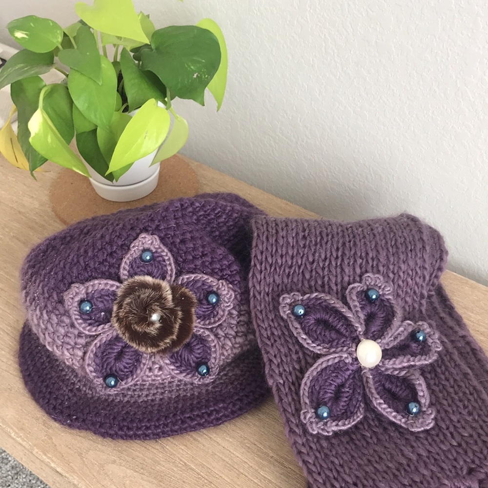 Beautiful hand knitted scarf and hat.